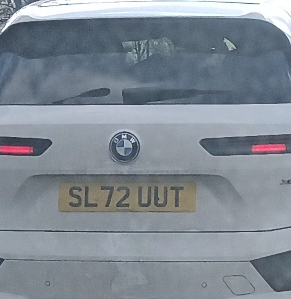 SL72 UUT private number plate on car